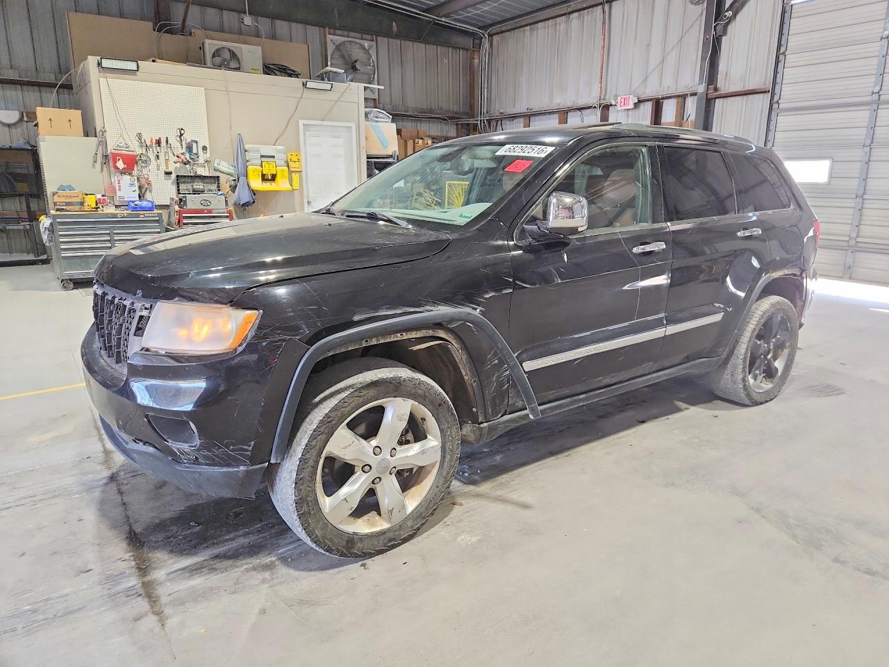 2013 JEEP GRAND CHER Overland — Front 3/4