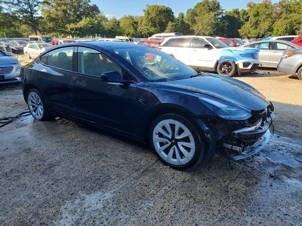 2023 TESLA MODEL 3 — Passenger 3/4