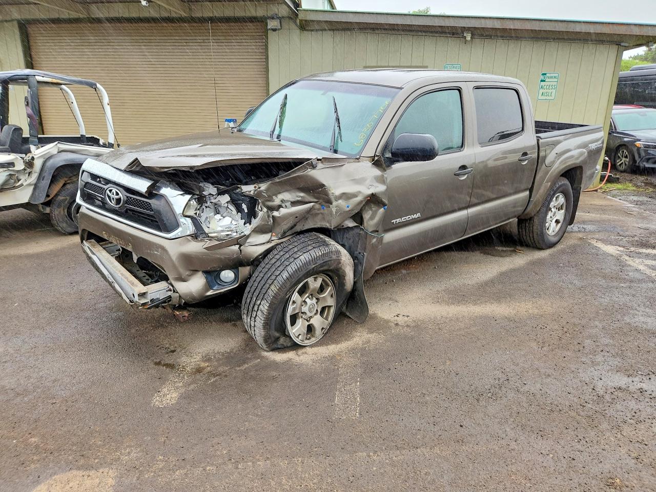2013 TOYOTA TACOMA Delux — Front 3/4