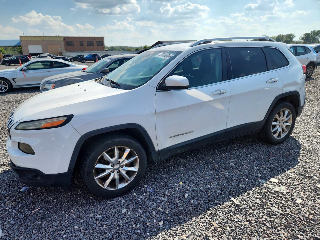 2014 JEEP CHEROKEE Limited — Front 3/4