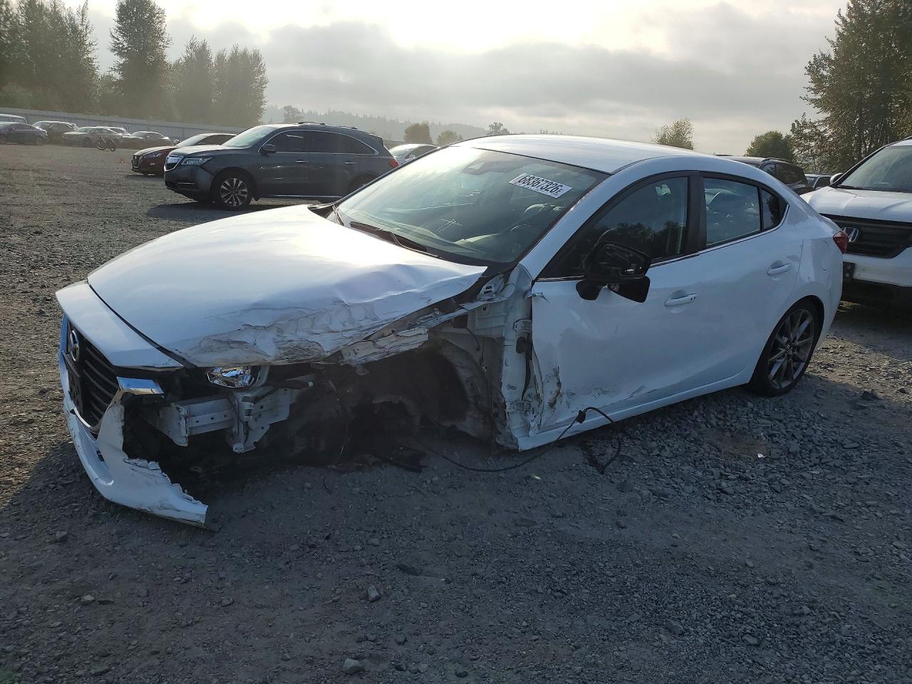 2018 MAZDA 3 Touring — Front 3/4