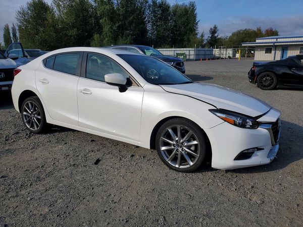 2018 MAZDA 3 Touring — Passenger 3/4