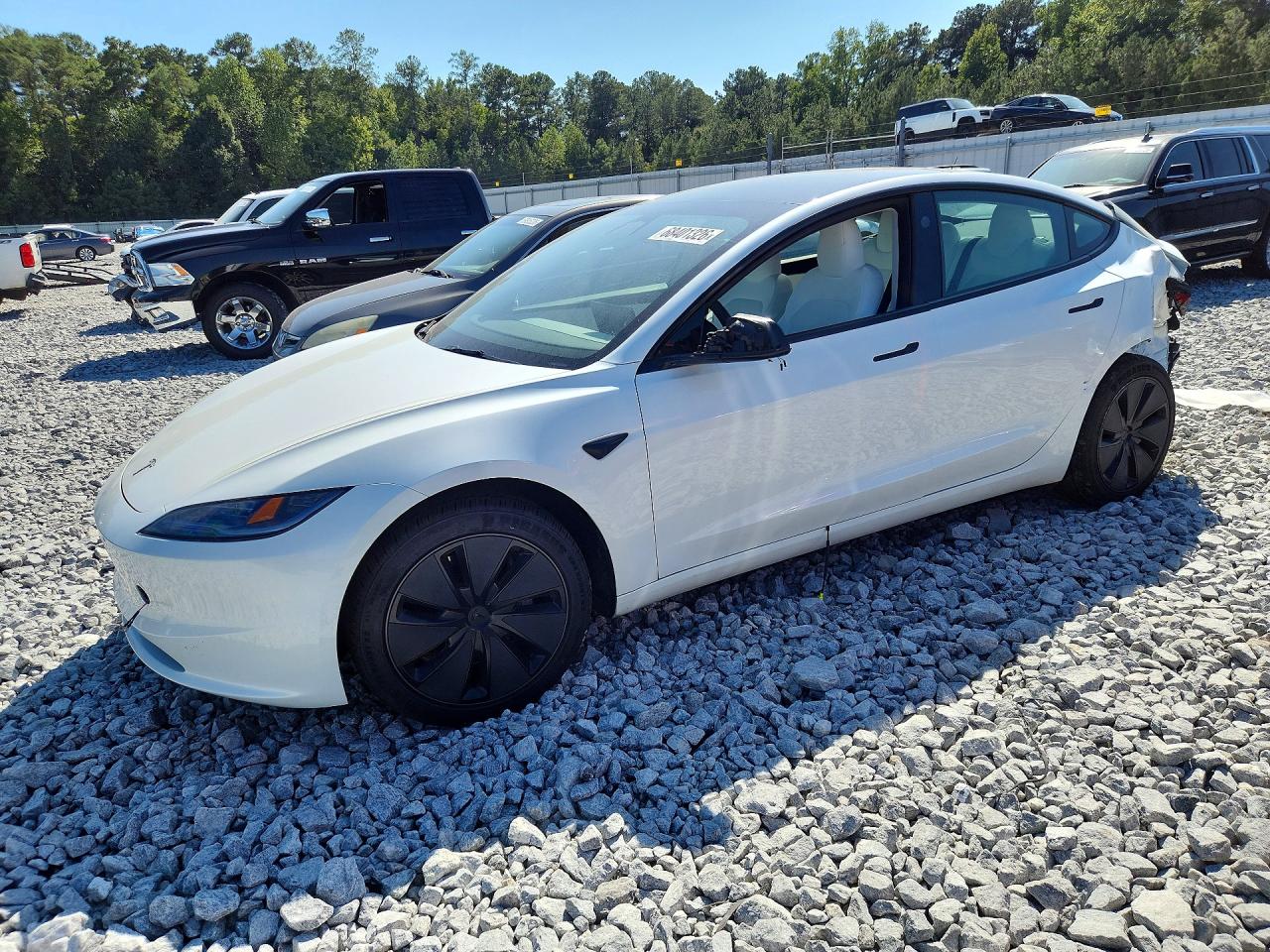 2024 TESLA MODEL 3 — Front 3/4