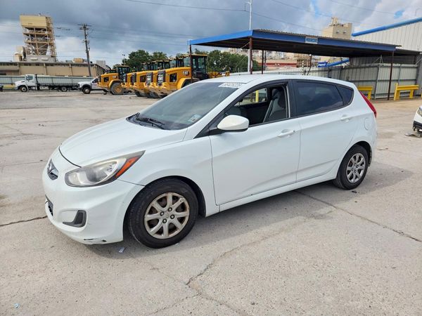 2014 HYUNDAI ACCENT 5DR GS / 4DR GLS — Front 3/4