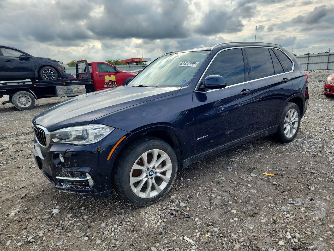 2014 BMW X5 xDrive35d — Front 3/4