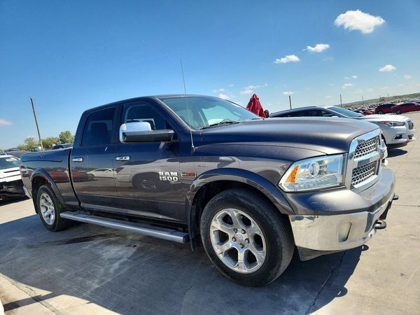 2015 RAM 1500 Laramie — Passenger 3/4