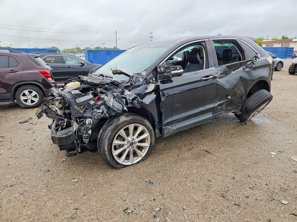 2017 FORD EDGE Titanium — Front 3/4