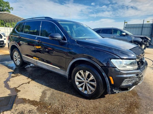 2018 VOLKSWAGEN TIGUAN SE, SEL — Passenger 3/4