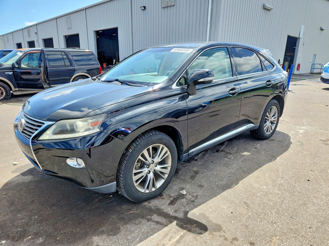 2013 LEXUS RX 450h — Front 3/4