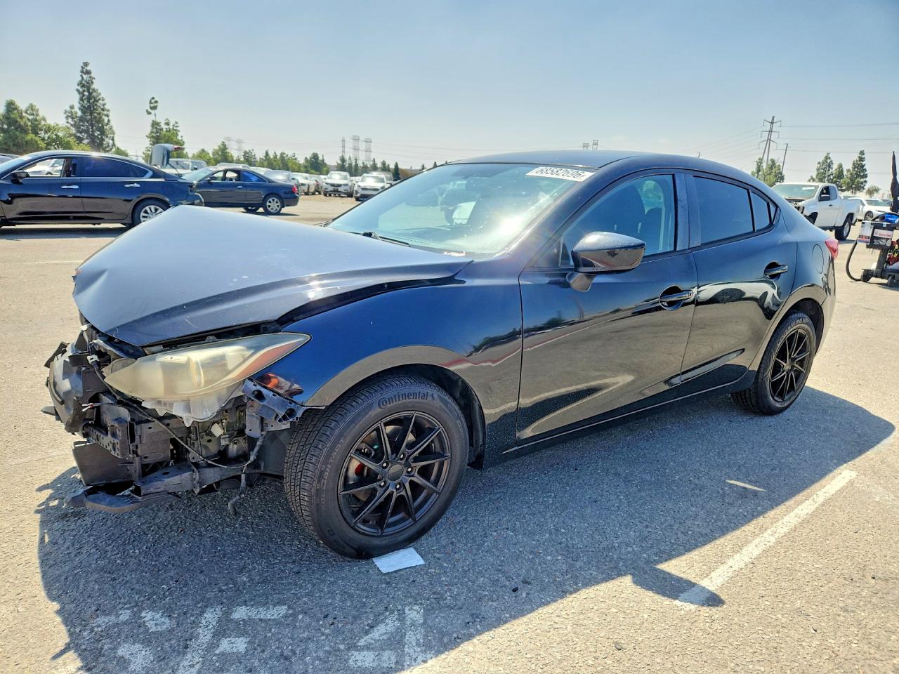 2015 MAZDA 3 — Front 3/4