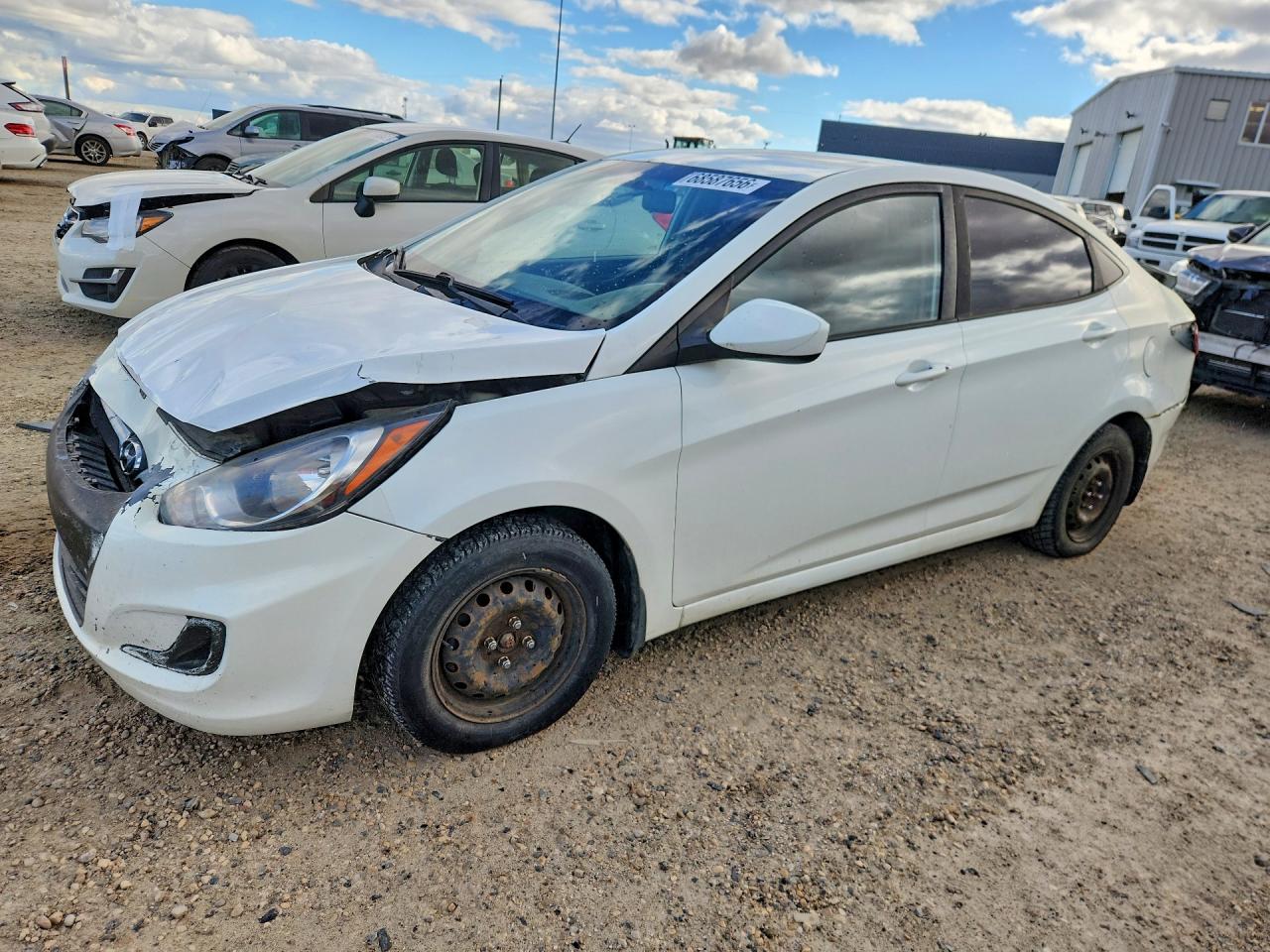 2012 HYUNDAI ACCENT GL (Middle-low grade) — Front 3/4