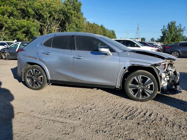2024 LEXUS UX 250h Luxury — Passenger 3/4