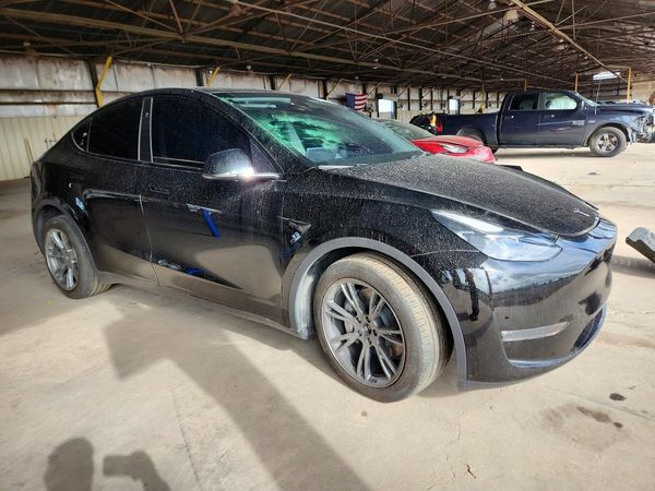 2024 TESLA MODEL Y — Passenger 3/4