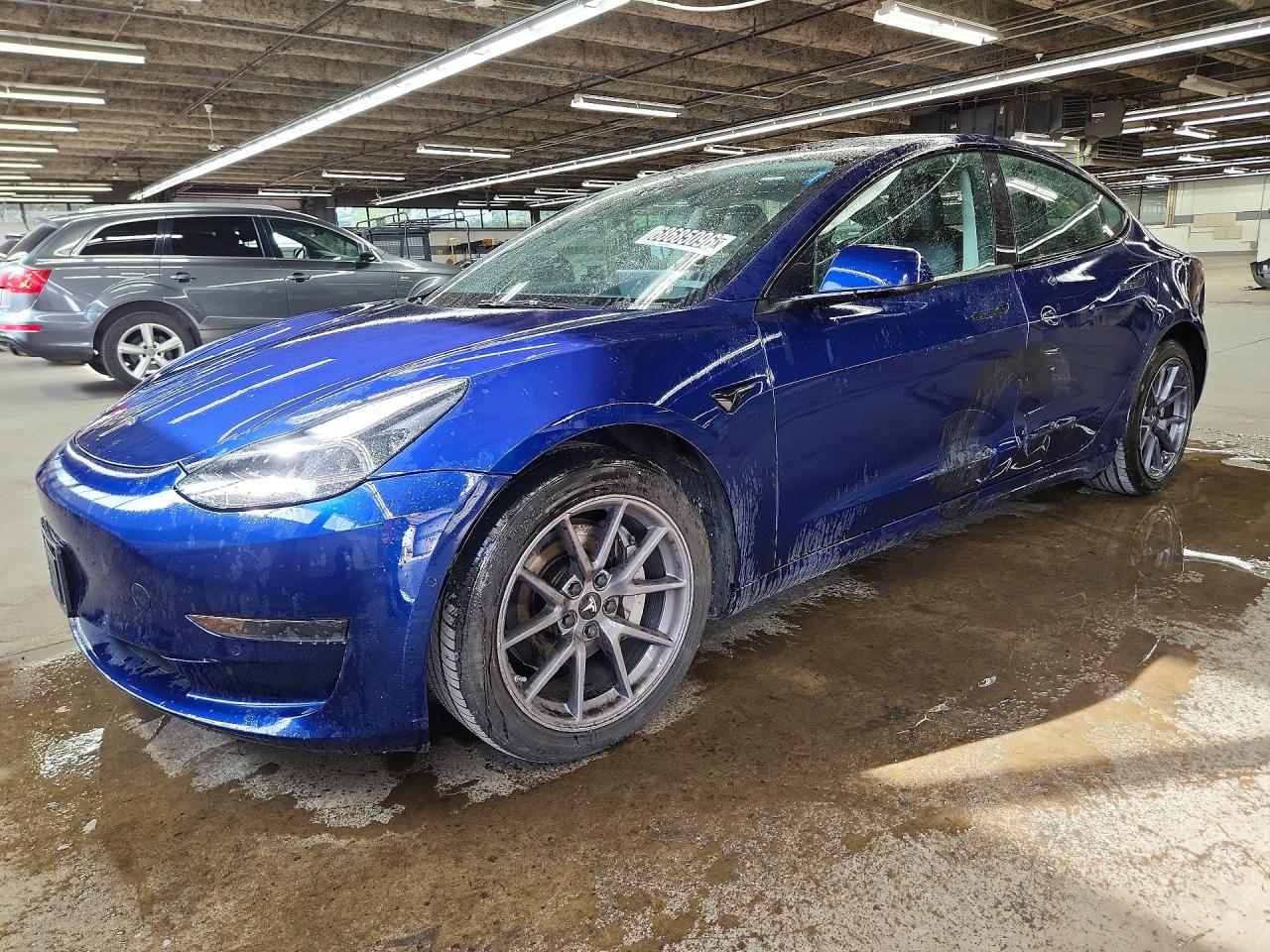 2022 TESLA MODEL 3 — Front 3/4