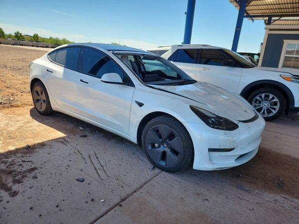 2023 TESLA MODEL 3 — Passenger 3/4