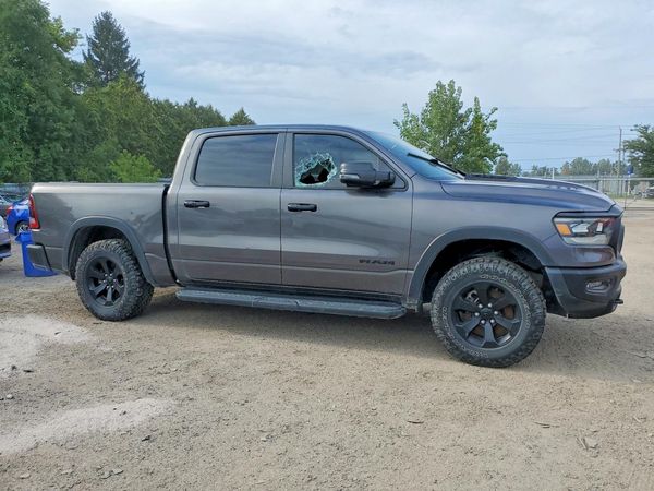 2023 RAM 1500 REBEL CREW CAB 4X4 — Passenger 3/4