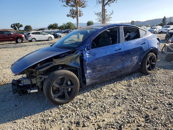 2026 TESLA MODEL Y — Front 3/4