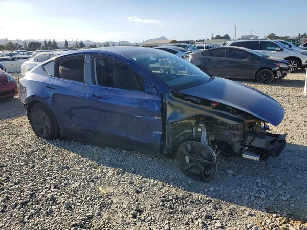 2026 TESLA MODEL Y — Passenger 3/4