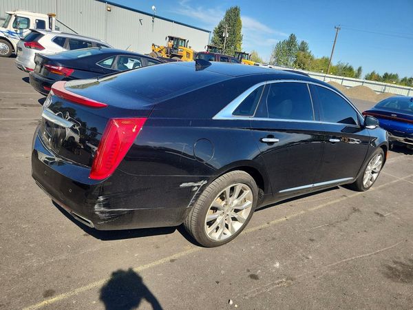 2015 CADILLAC XTS — PSRA