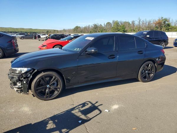 2023 BMW 330XI — Front 3/4