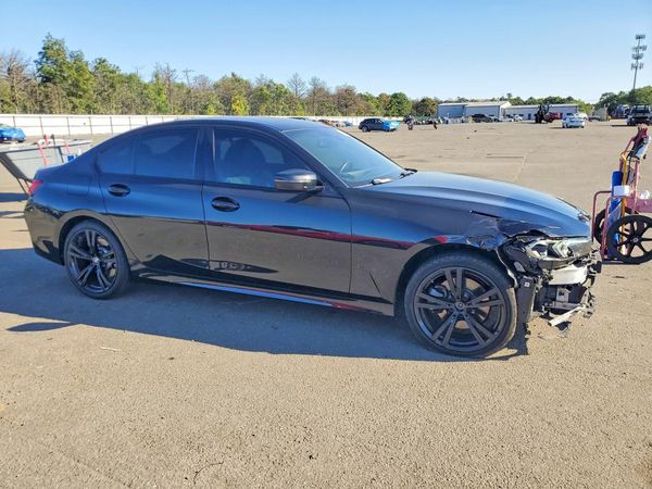 2023 BMW 330XI — Passenger 3/4