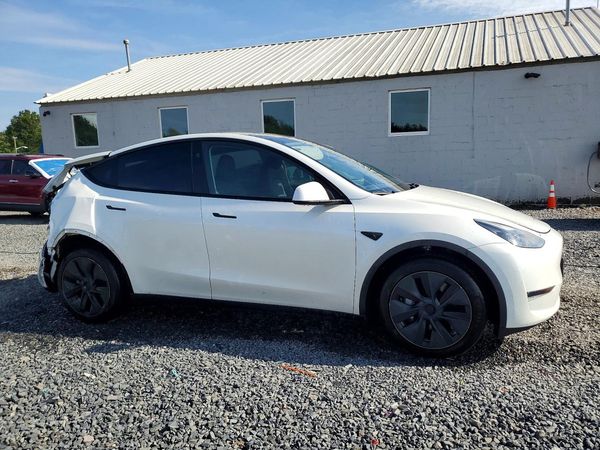 2024 TESLA MODEL Y — Passenger 3/4