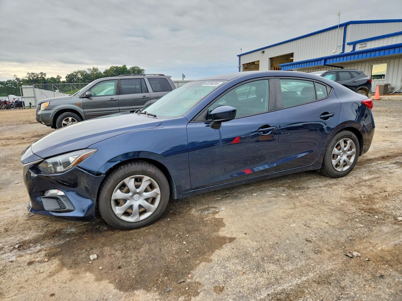2015 MAZDA 3 Sport/GX — Front 3/4