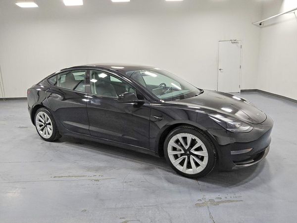 2023 TESLA MODEL 3 — Passenger 3/4