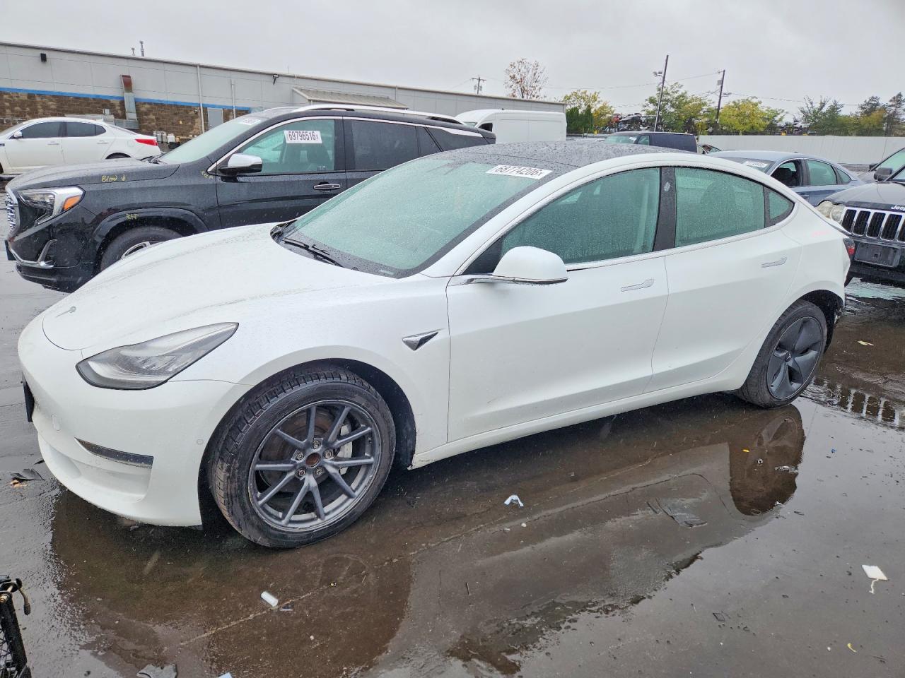 2019 TESLA MODEL 3 — Front 3/4