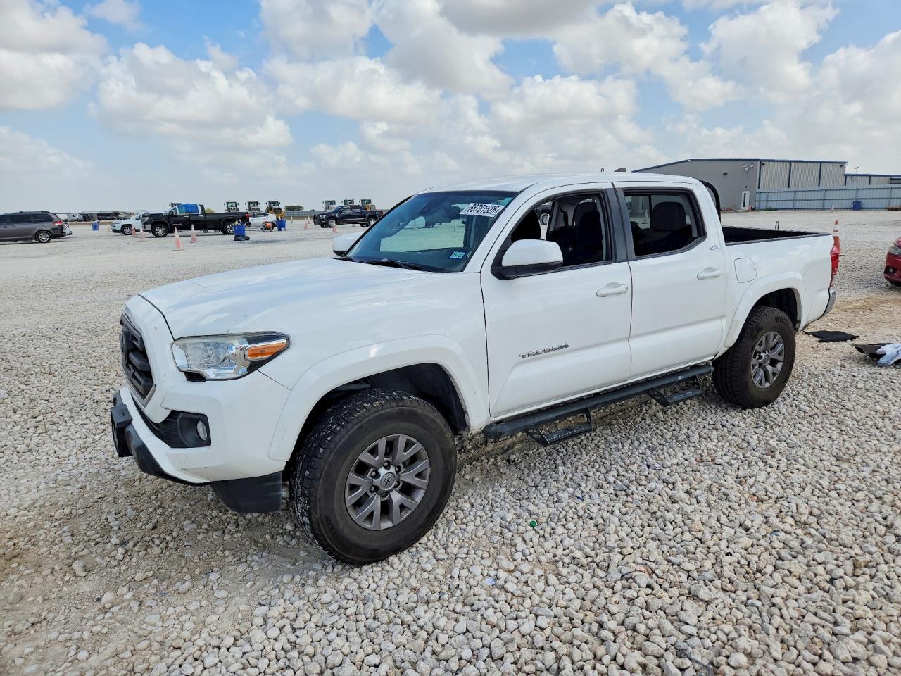 2019 TOYOTA TACOMA SR5 — Front 3/4