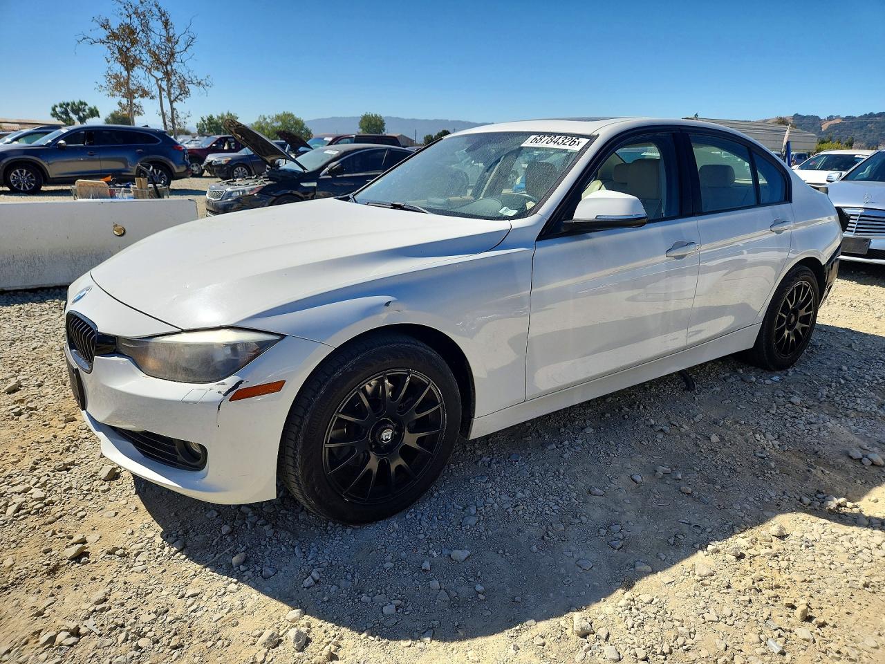 2013 BMW 328 xDrive SA — Front 3/4