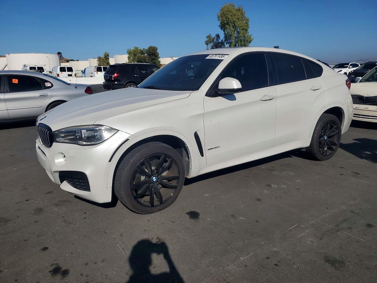 2016 BMW X6 xDrive50i — Front 3/4