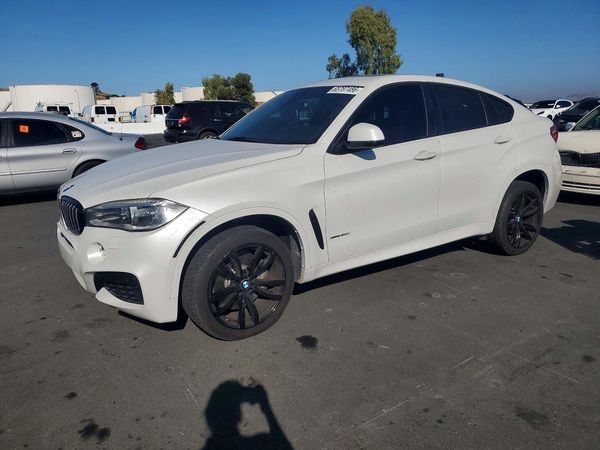 2016 BMW X6 xDrive50i — Front 3/4