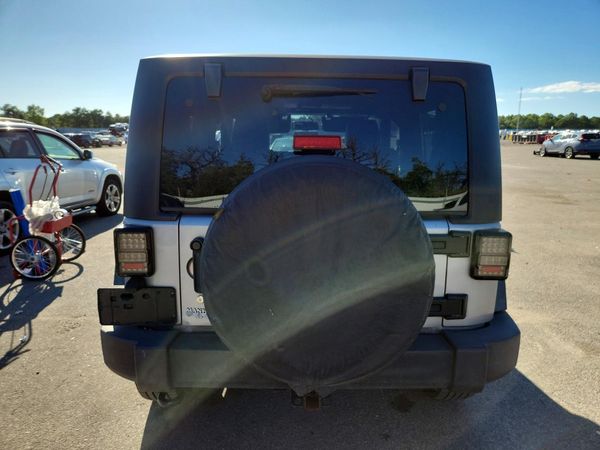 2014 JEEP WRANGLER Sport — DIRR