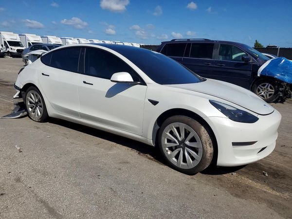 2023 TESLA MODEL 3 — Passenger 3/4
