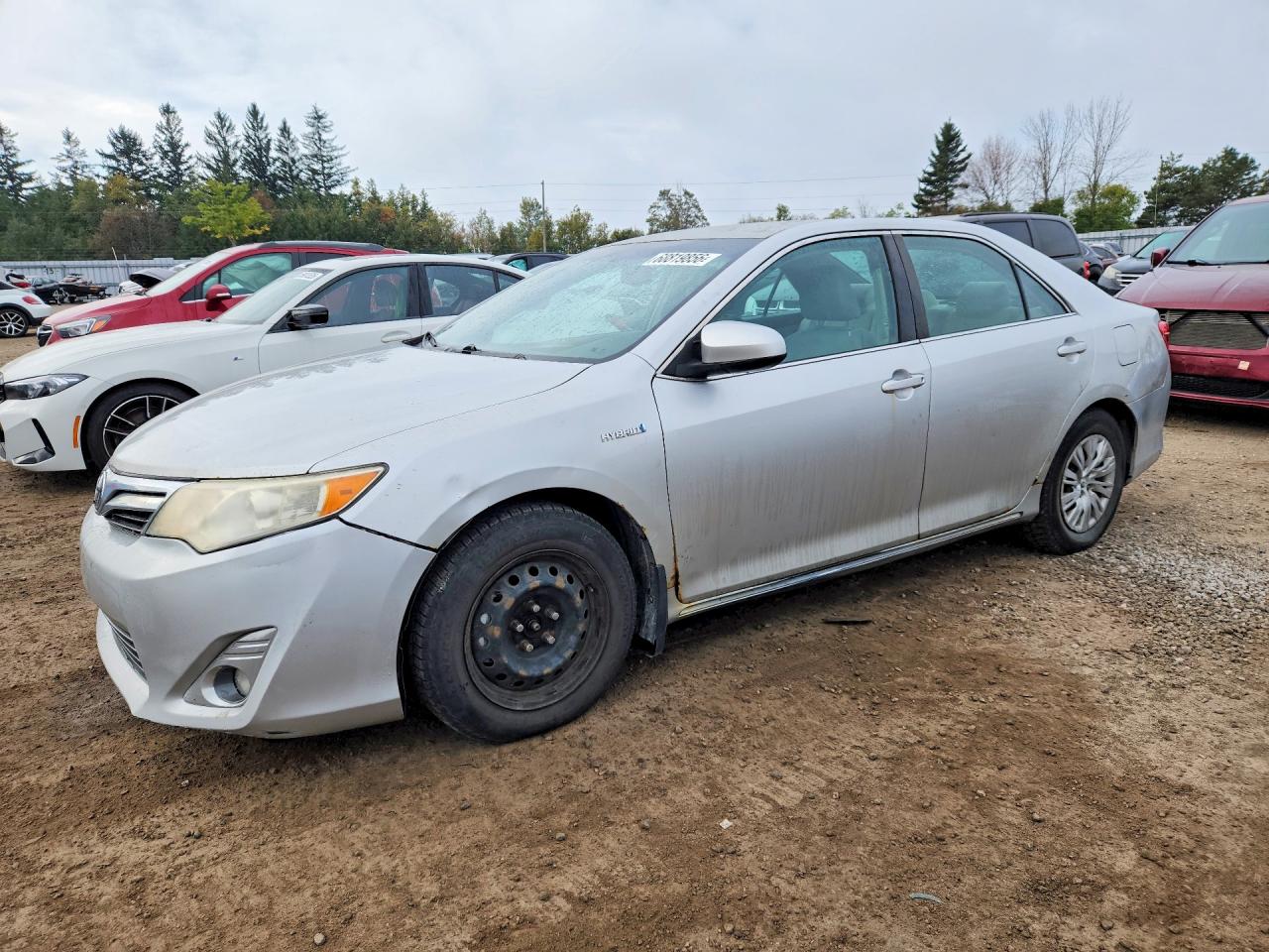 2013 TOYOTA CAMRY Hybrid — Front 3/4
