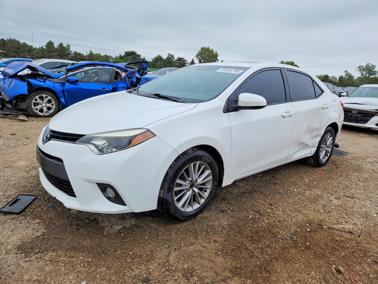 2014 TOYOTA COROLLA L/LE — Front 3/4