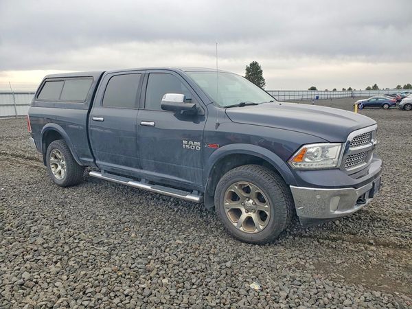 2016 RAM 1500 Laramie — Passenger 3/4