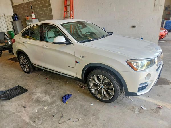 2015 BMW X4 xDrive28i — Passenger 3/4