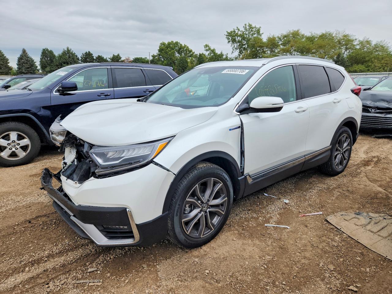 2021 HONDA CR-V HYBRID TOURING — Front 3/4