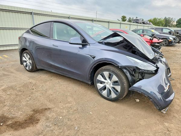 2023 TESLA MODEL Y — Passenger 3/4
