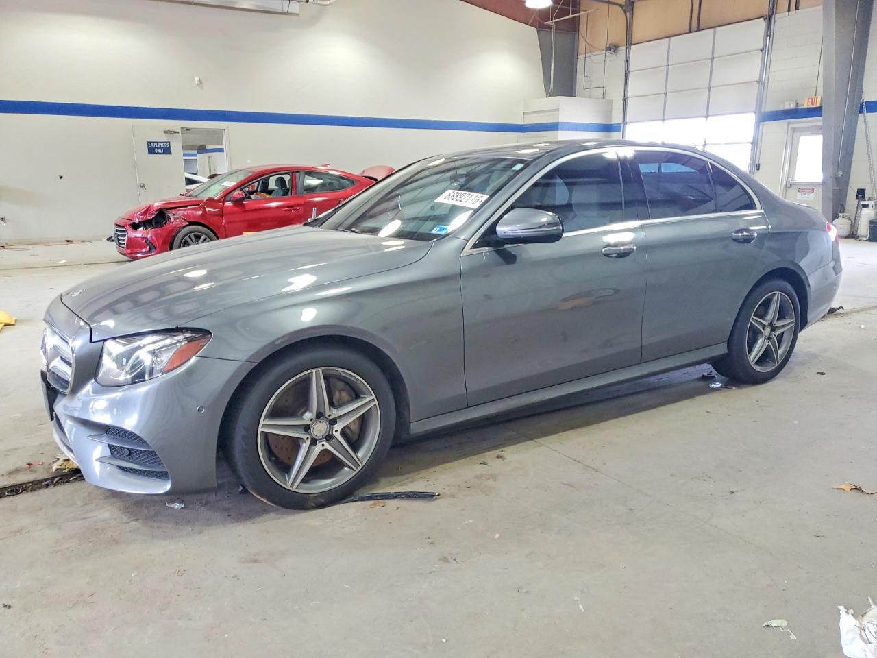 2017 MERCEDES-BENZ E E300-4M — Front 3/4