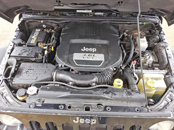 2013 JEEP WRANGLER Sahara — Engine bay