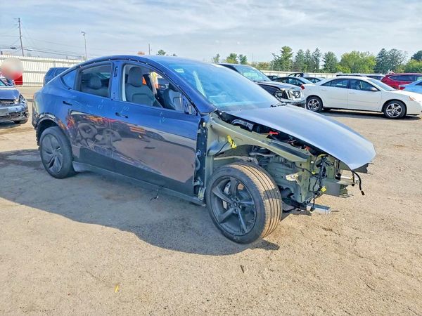 2026 TESLA MODEL Y — Passenger 3/4