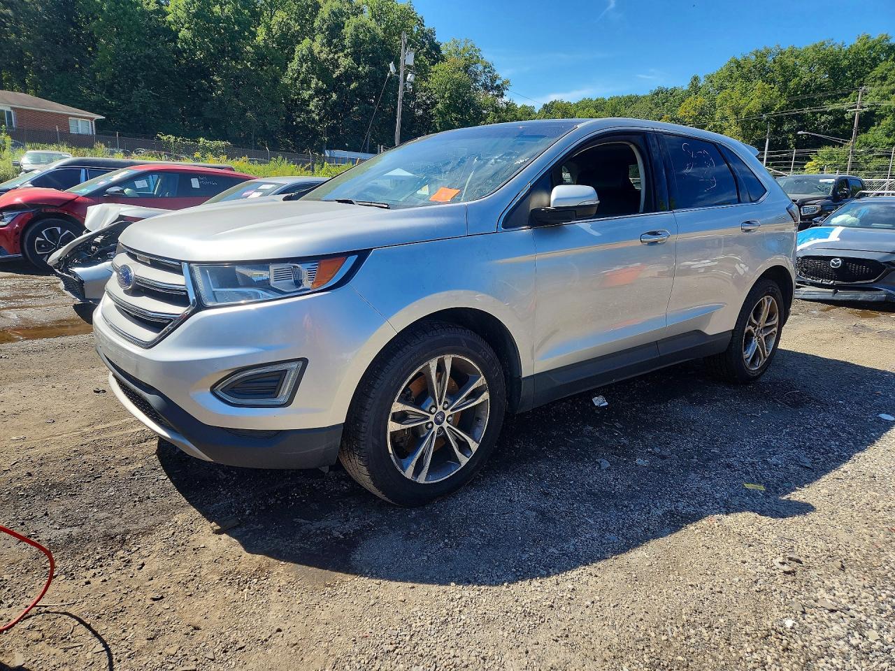 2018 FORD EDGE Titanium — Front 3/4