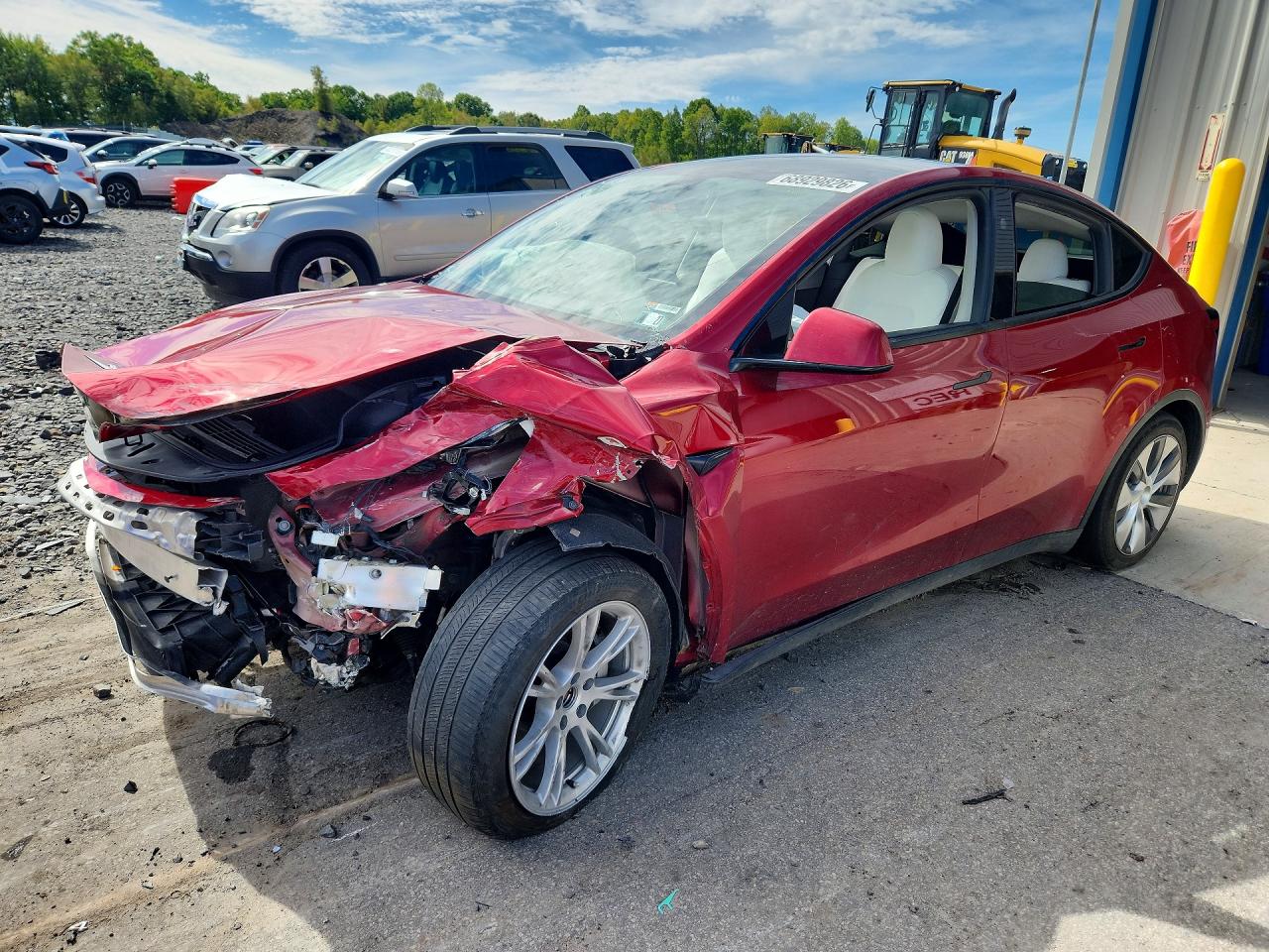 2024 TESLA MODEL Y — Front 3/4