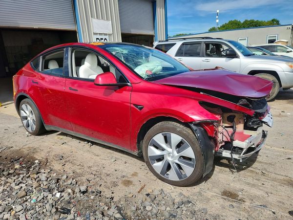 2024 TESLA MODEL Y — Passenger 3/4