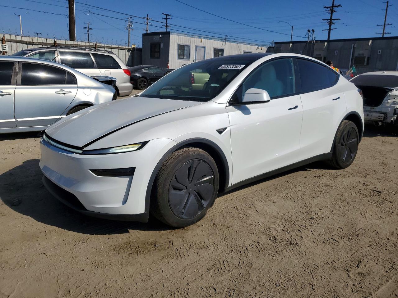 2026 TESLA MODEL Y — Front 3/4