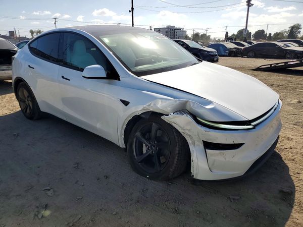 2026 TESLA MODEL Y — Passenger 3/4