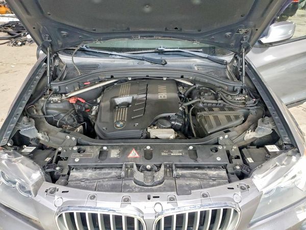 2012 BMW X3 xDrive28i — Engine bay